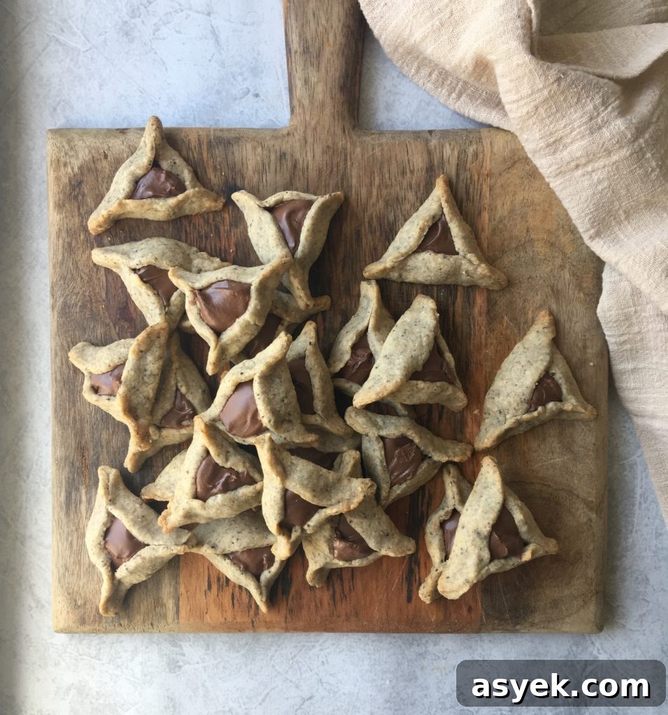 Nutella-Filled Espresso Hazelnut Hamantaschen 4 espresso-hazelnut hamantaschen with Nutella