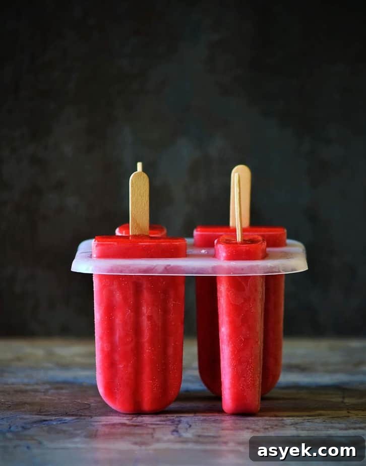 Strawberry popsicles recipe all set in the popsicle molds