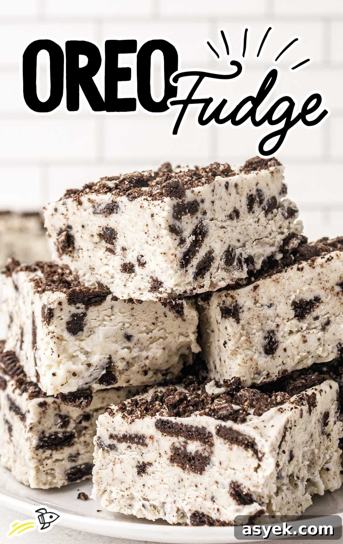No-Bake Oreo Fudge Recipe 2 close up shot of oreo fudge stacked on top of each other on a plate