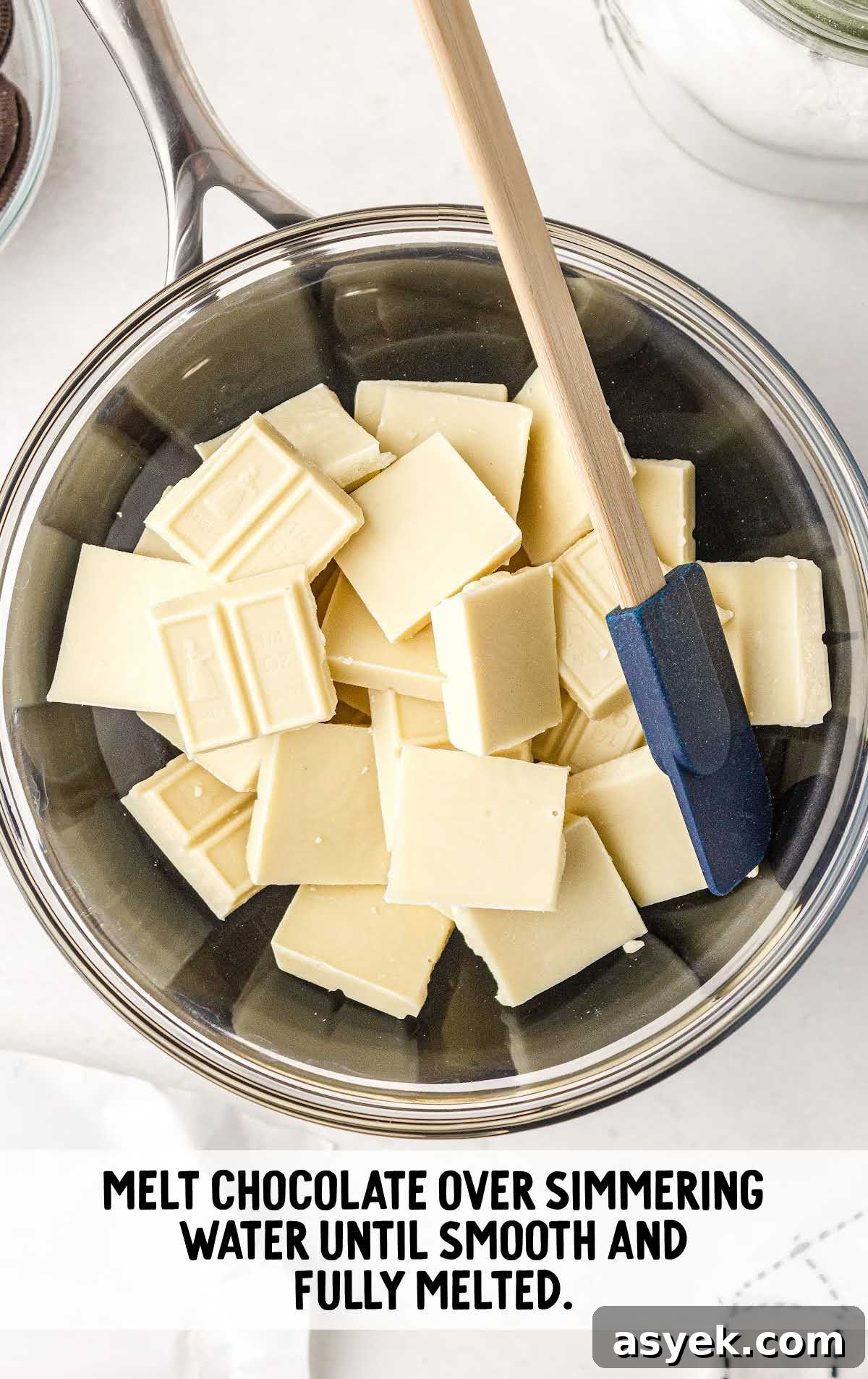 No-Bake Oreo Fudge Recipe 5 white chocolate put over the simmering water to melt