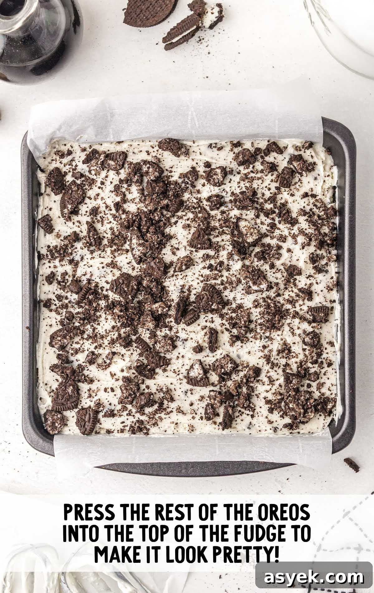 No-Bake Oreo Fudge Recipe 7 oreos pressed into the top of the fudge