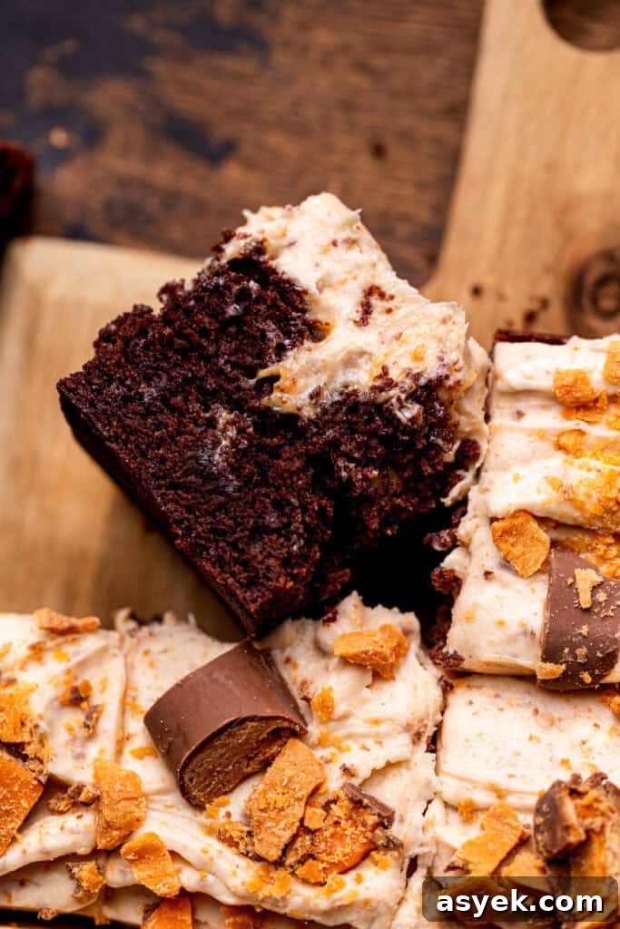 One piece of butterfinger cake on its side.
