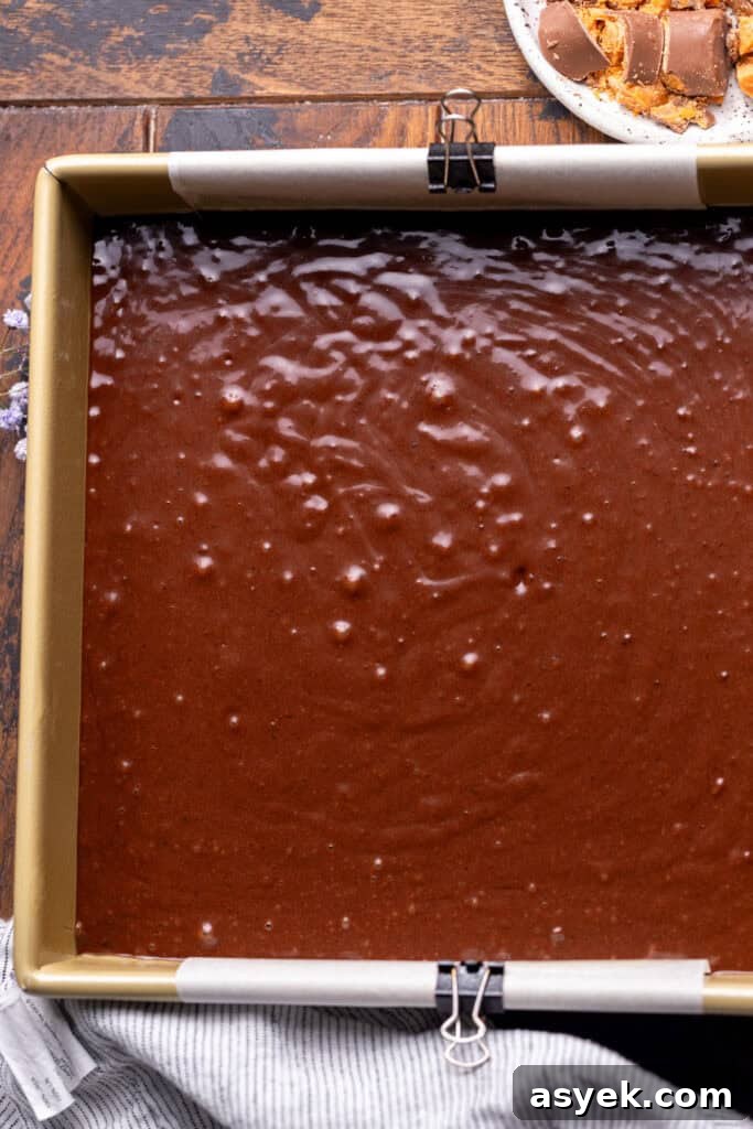 Cake batter in the pan.