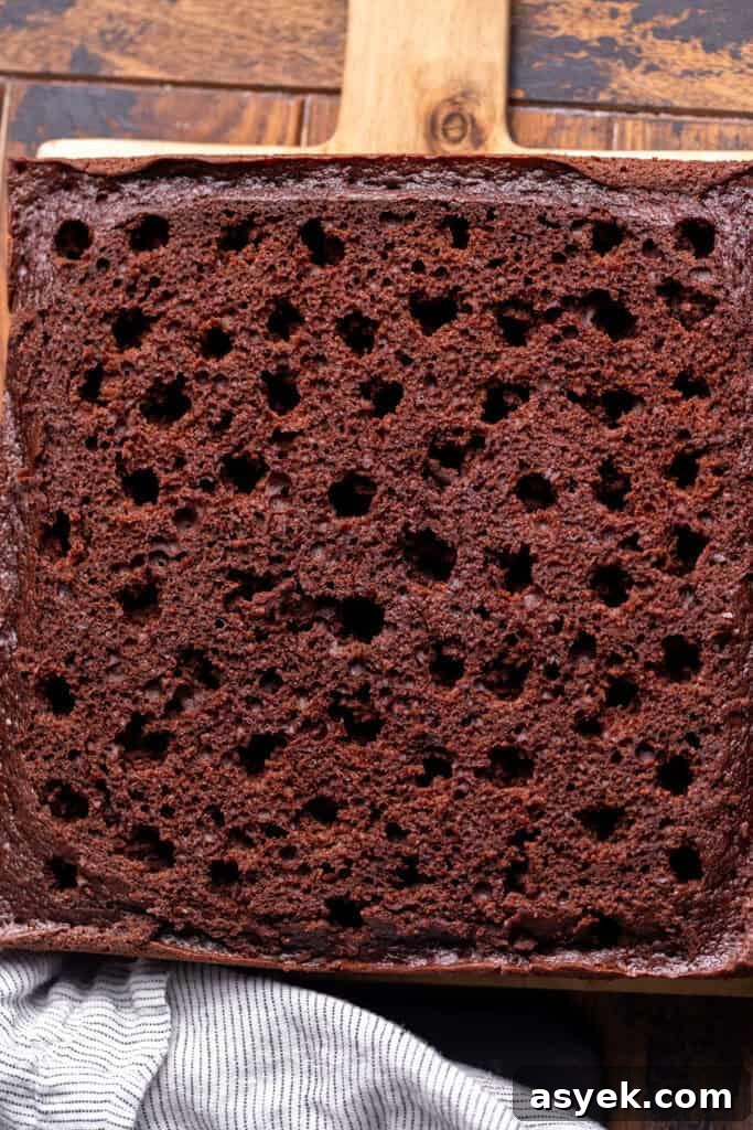 Cake poked with holes.