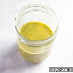nicoise salad dressing in glass mason jar