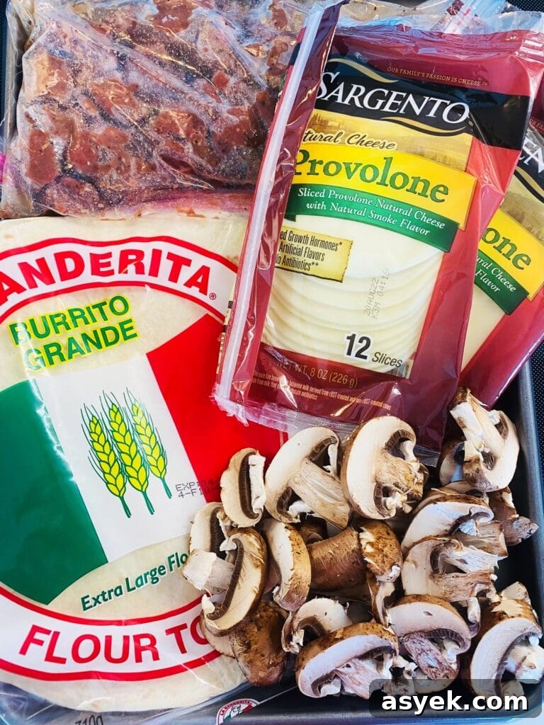 Blackstone Steak and Mushroom Quesadilla Recipe 5 ingredients for the quesadillas on a tray