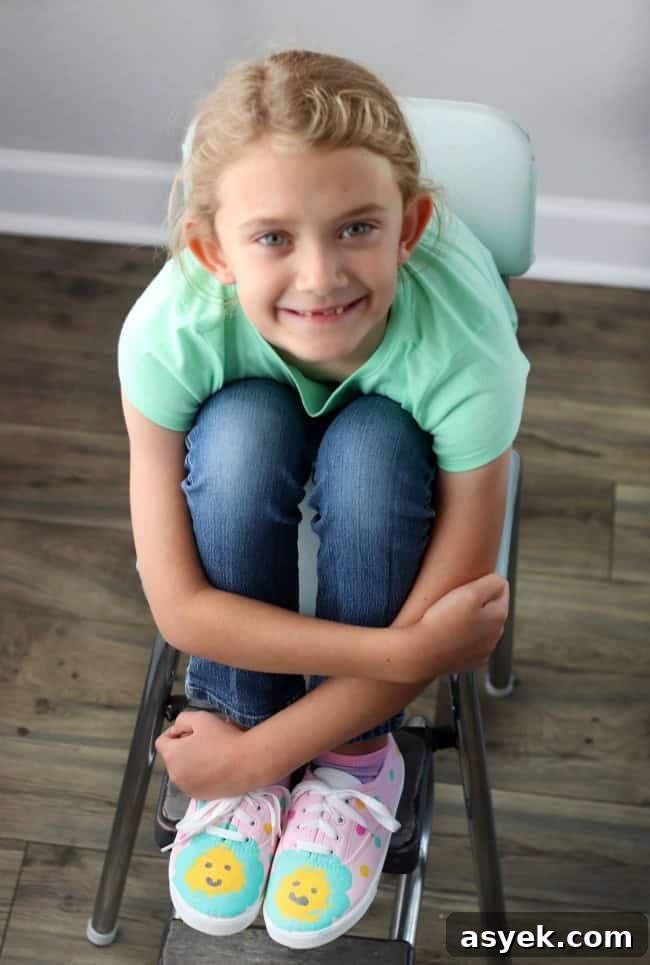 girl wearing painted shoes for kids