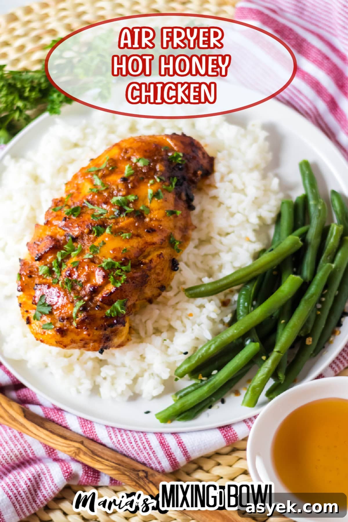 air fryer hot honey chicken breast on top of a bed of rice