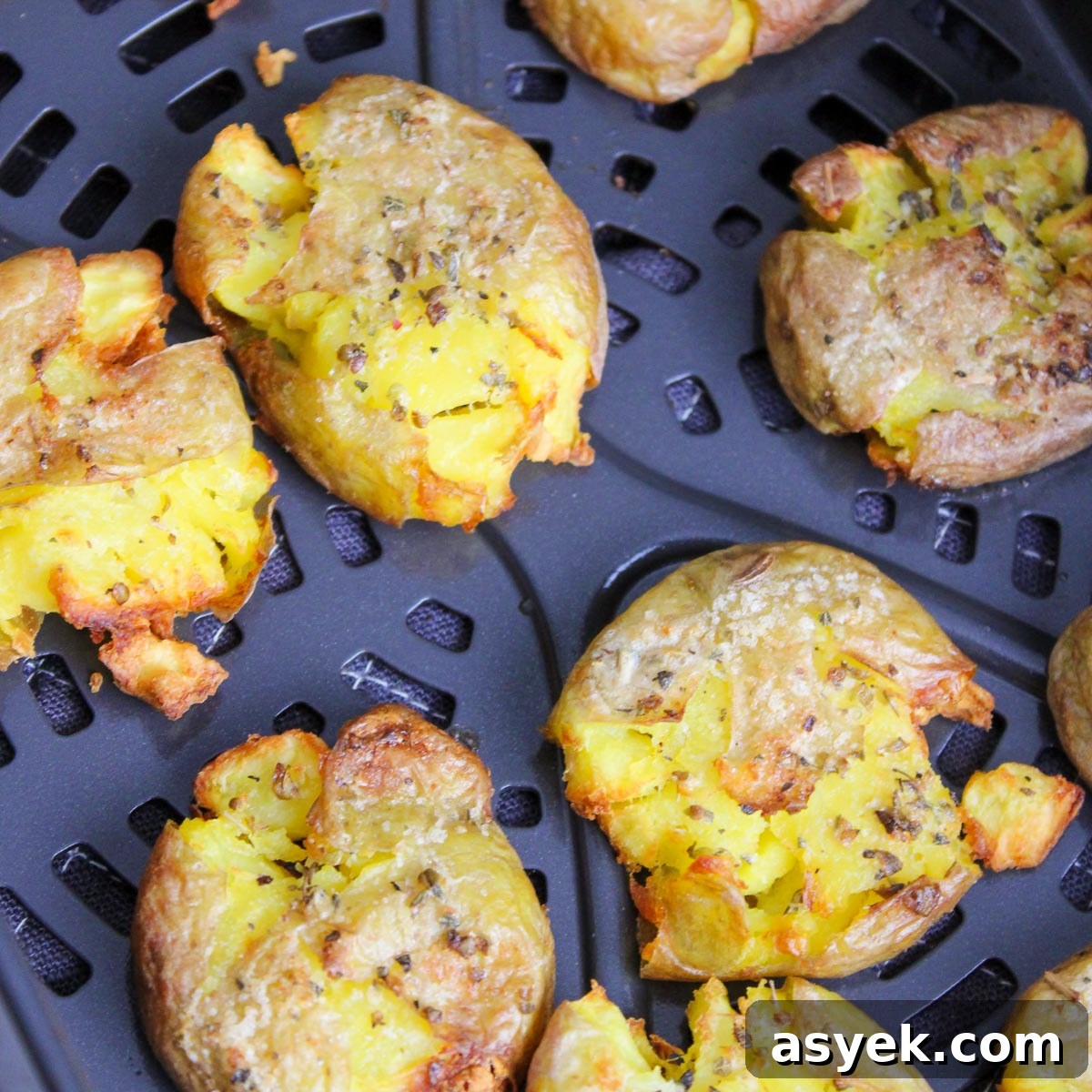 Cooked potatoes in an air fryer until they are golden brown.