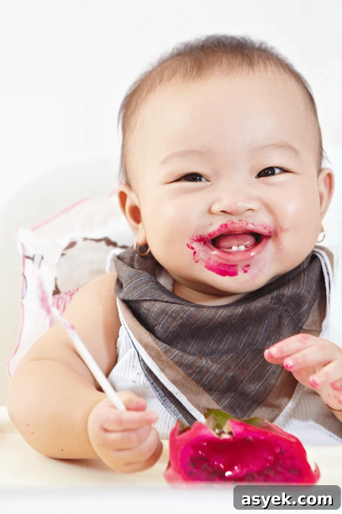 baby eating fruit