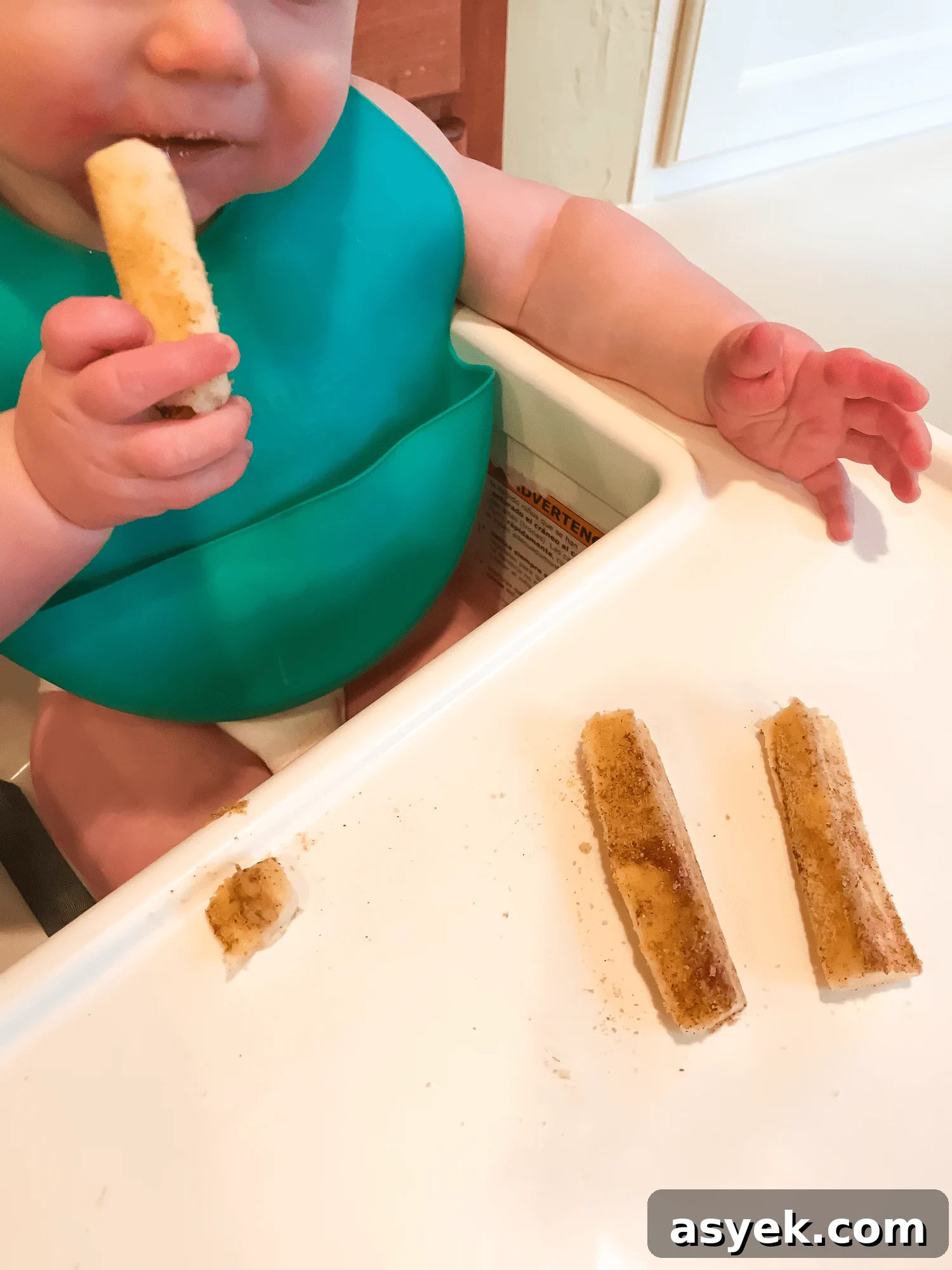 baby eating bananas