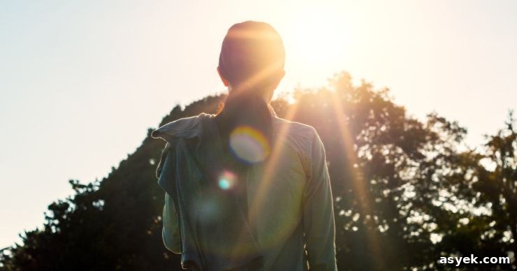 woman looking at sun