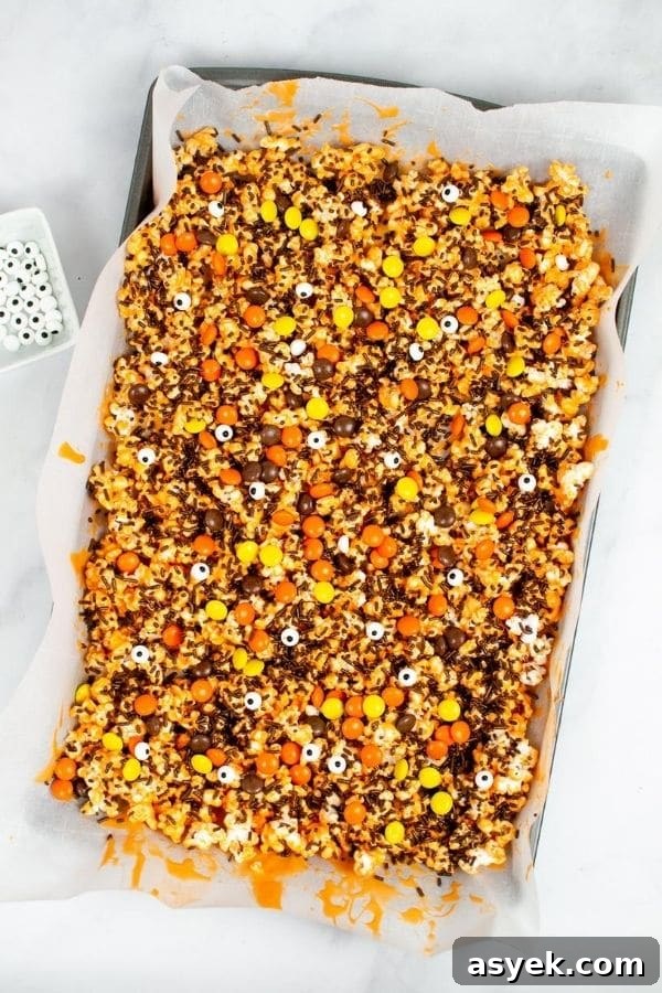 Instant Pot Monster Munch Popcorn Recipe 4 Halloween popcorn mix on sheet pan
