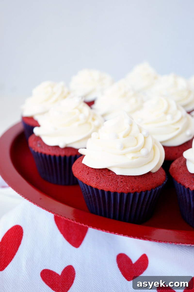 Red Velvet Cupcakes Recipe with Cream Cheese Frosting 2 red velvet cupcakes with cream cheese frosting | The Baking Fairy