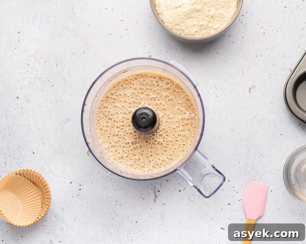 High-Protein Almond Flour Banana Muffins: Gluten-Free Snacks 5 blended almond flour banana muffin batter n a food processor