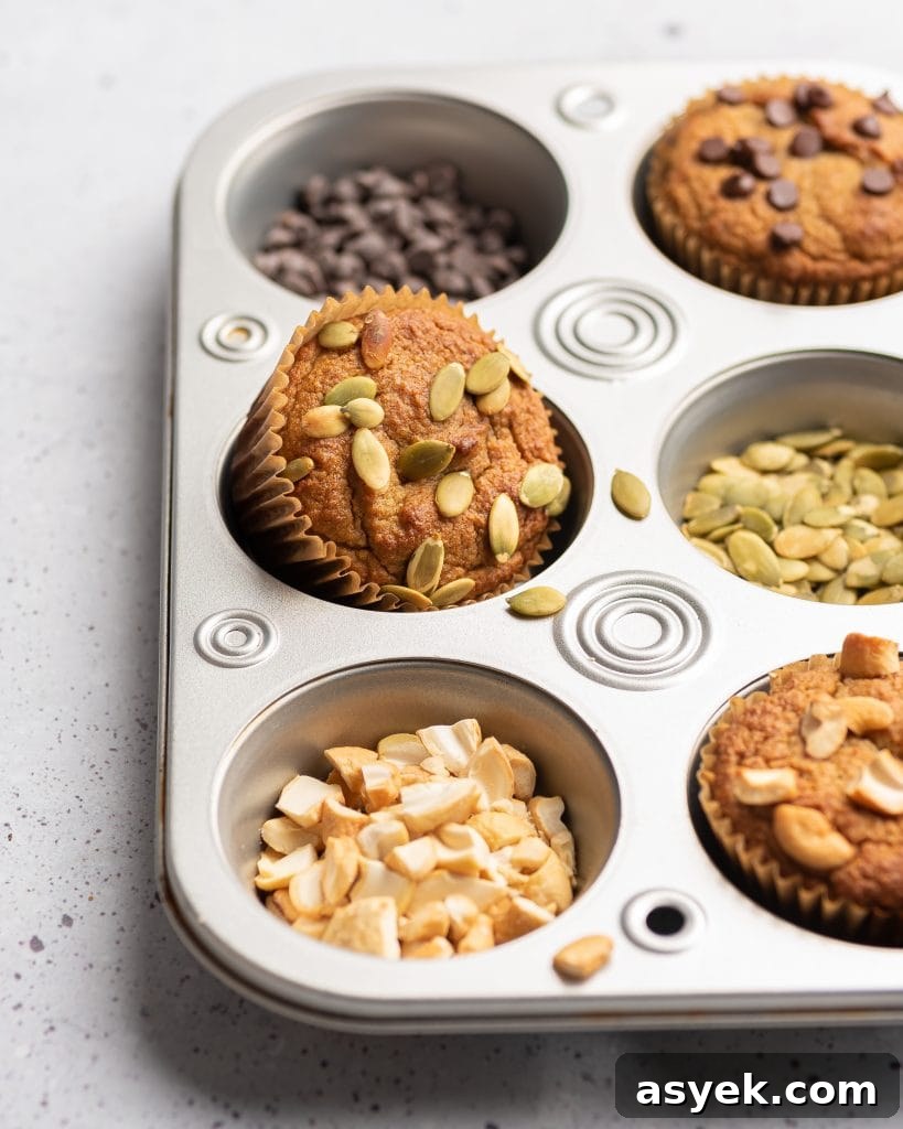 High-Protein Almond Flour Banana Muffins: Gluten-Free Snacks 9 muffin tin with almond flour banana muffin topped with pumpkin seeds