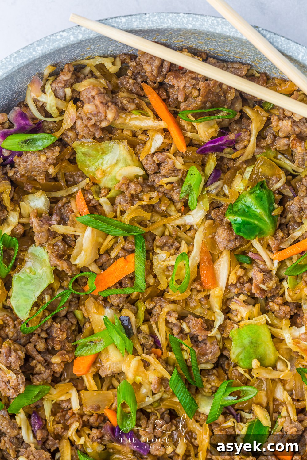 Egg Roll in a Bowl is a delicious deconstructed take on traditional egg rolls, featuring hearty ground sausage stir-fried with vegetables. 
