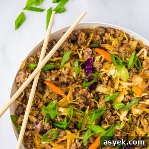 Egg Roll in a Bowl is a delicious deconstructed take on traditional egg rolls, featuring hearty ground sausage stir-fried with vegetables.