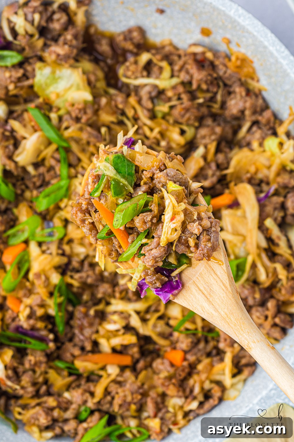 Egg Roll in a Bowl is a delicious deconstructed take on traditional egg rolls, featuring hearty ground sausage stir-fried with vegetables.