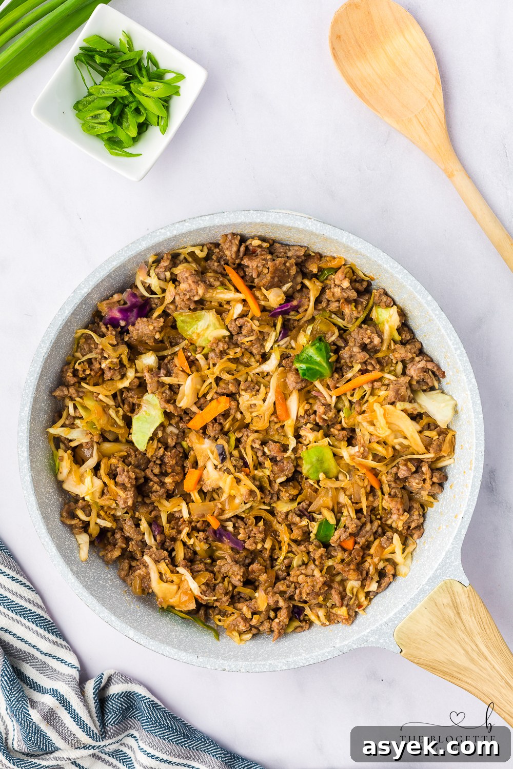Pour the sauce into the skillet and stir