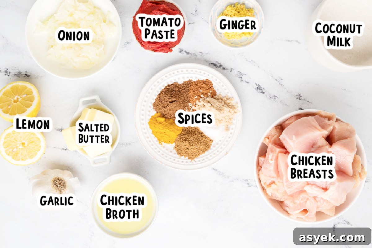 Ingredients for butter chicken on a table.