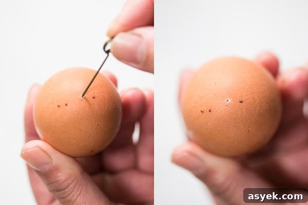 How to Peel Hard-Boiled Eggs Perfectly Every Time 4 Poking hole in egg