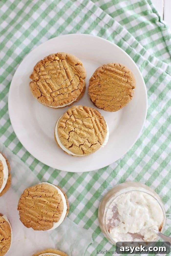 Classic Peanut Butter Sandwich Cookies with Creamy Filling 7 Sandwich cookies on a serving plate.