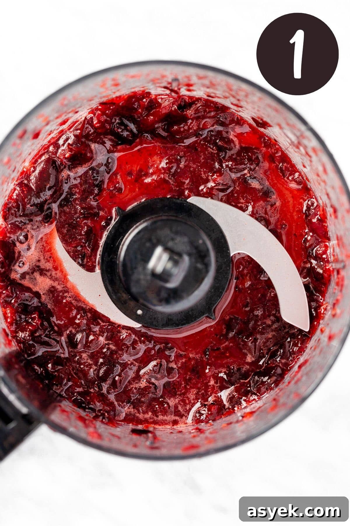 Fluffy Cherry Pancakes with Maple Syrup 4 A process photo illustrating step 1: blending the cherries.