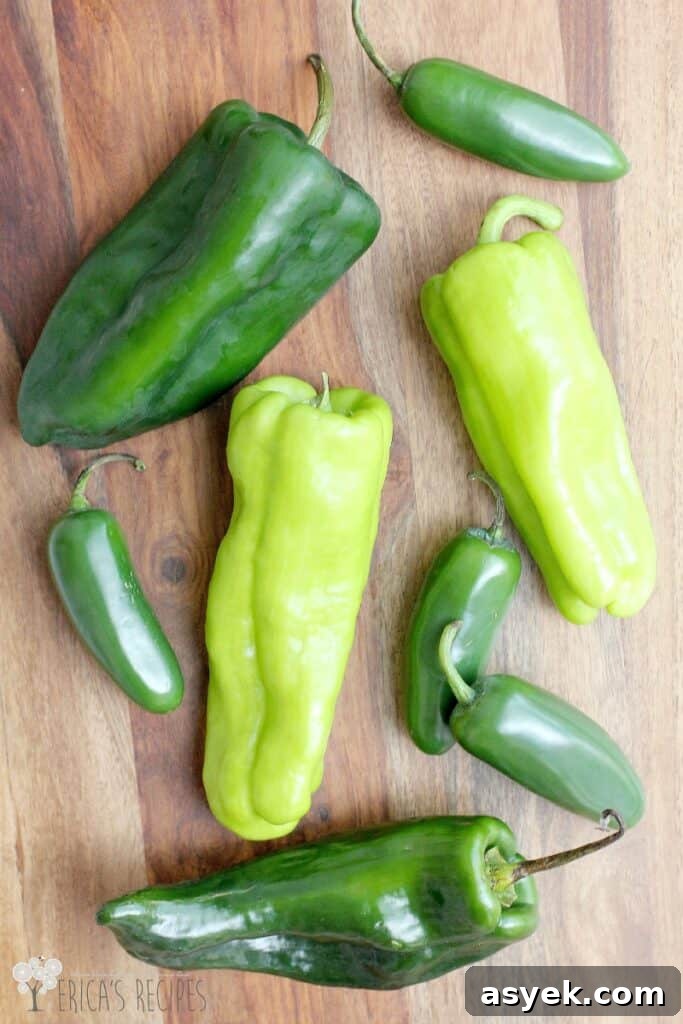 Jalapeno Popper Pizza Recipe with Cream Cheese Filling 6 top down view of the whole peppers before cooking on a wood cutting board