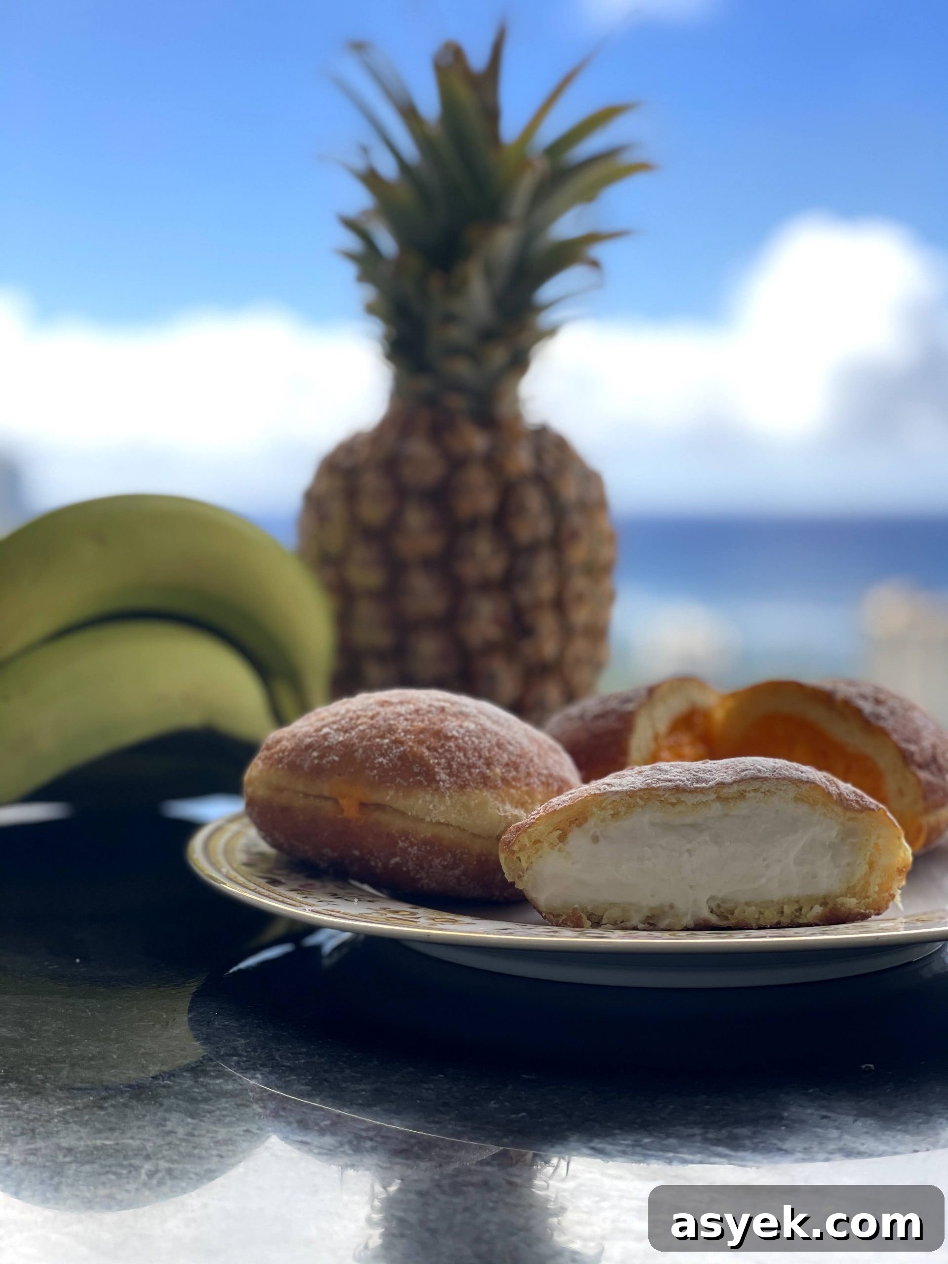 Coconut cream and lilikoi (passion fruit) malasadas