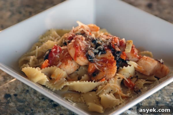 Seared scallops on fresh pasta.