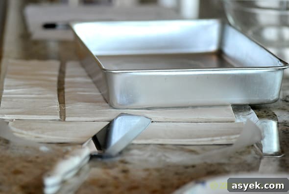 sheets of phyllo dough on counter 