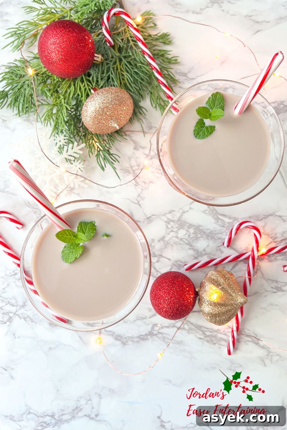 chocolate peppermint martini served with a candy cane and made with Smirnoff peppermint twist vodka and chocolate Baileys Irish cream