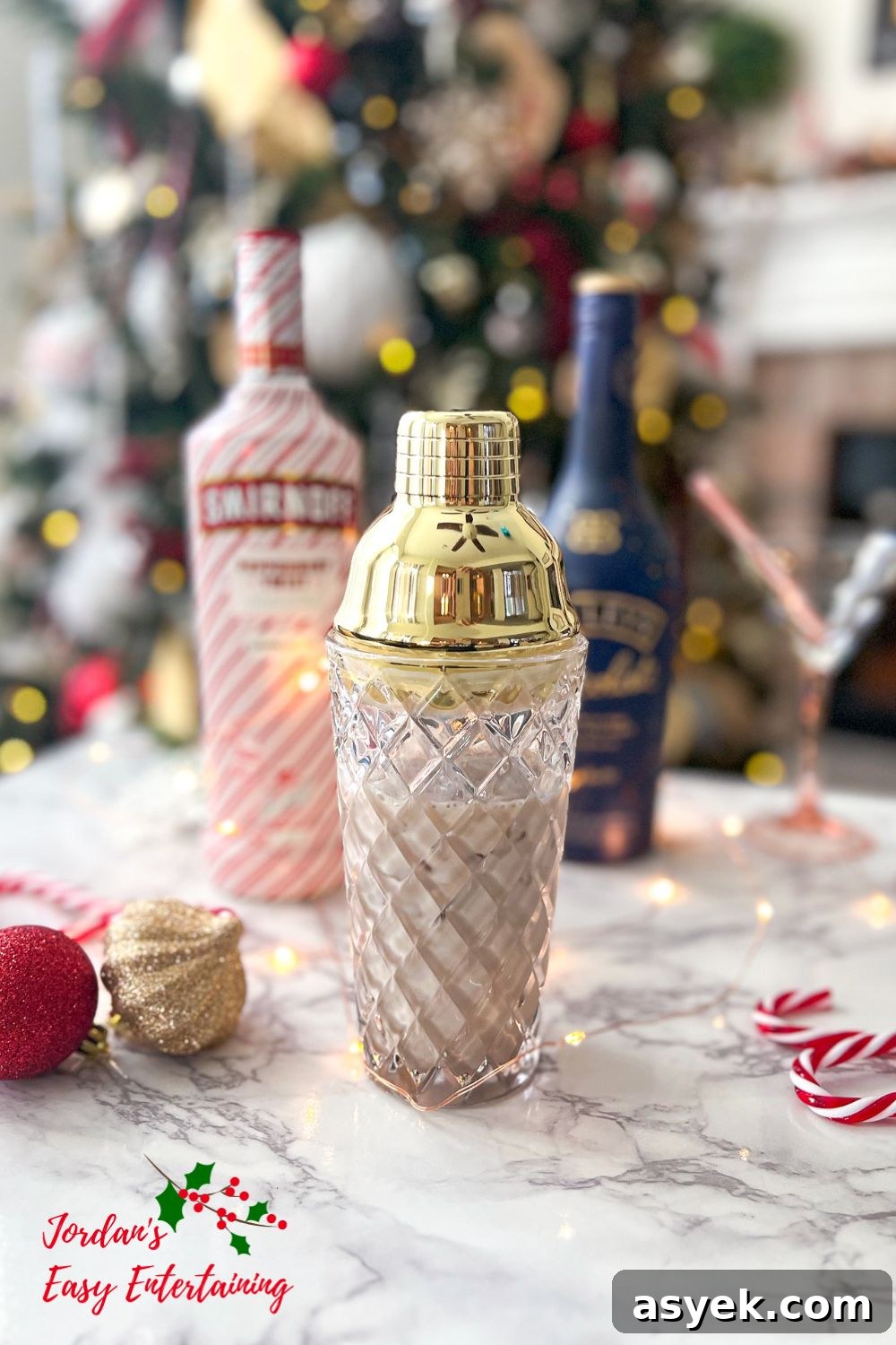 a cocktail shaker filled with a chocolate peppermint martini made with Smirnoff Peppermint vodka and Chocolate Baileys Irish cream