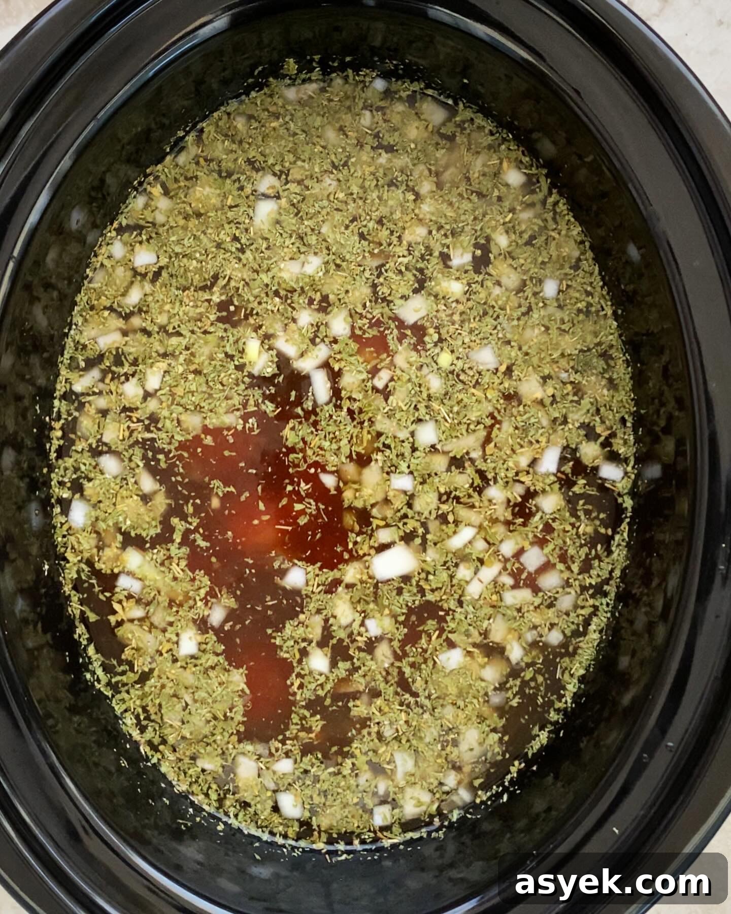 uncooked Italian wedding soup in crockpot