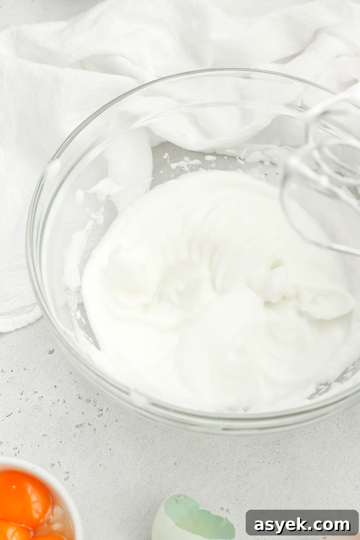Egg whites whipped to soft peaks