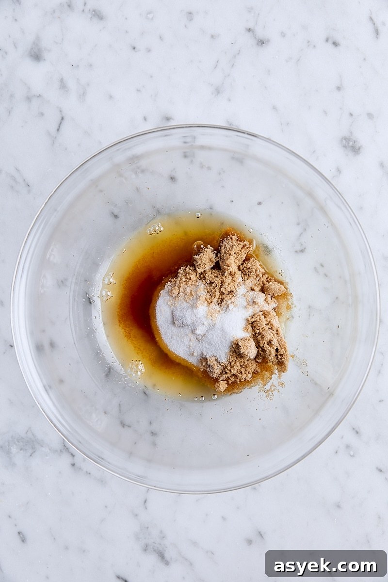 Small Batch Oatmeal Chocolate Chip Cookies Recipe 6 Brown butter, granulated sugar, and light brown sugar in glass bowl