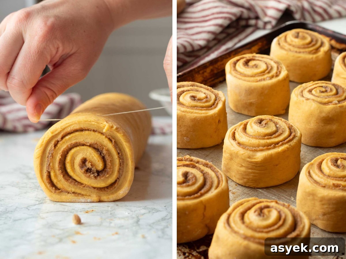Homemade Pumpkin Cinnamon Rolls with Maple Glaze 9 Cutting pumpkin cinnamon roll and raw cinnamon rolls on pan.