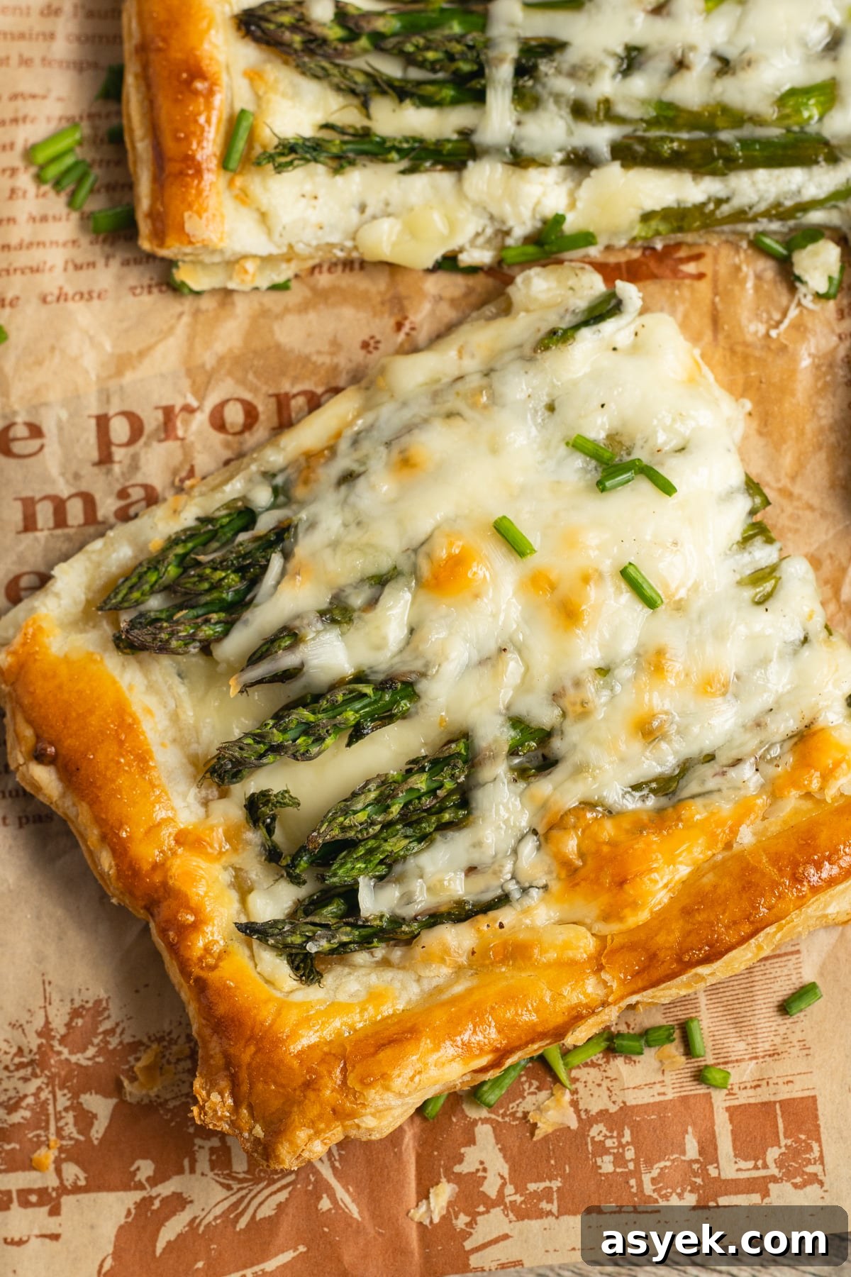 Asparagus and Boursin Puff Pastry Tart Recipe 17 This is a picture of a slice of the asparagus puff pastry tart.