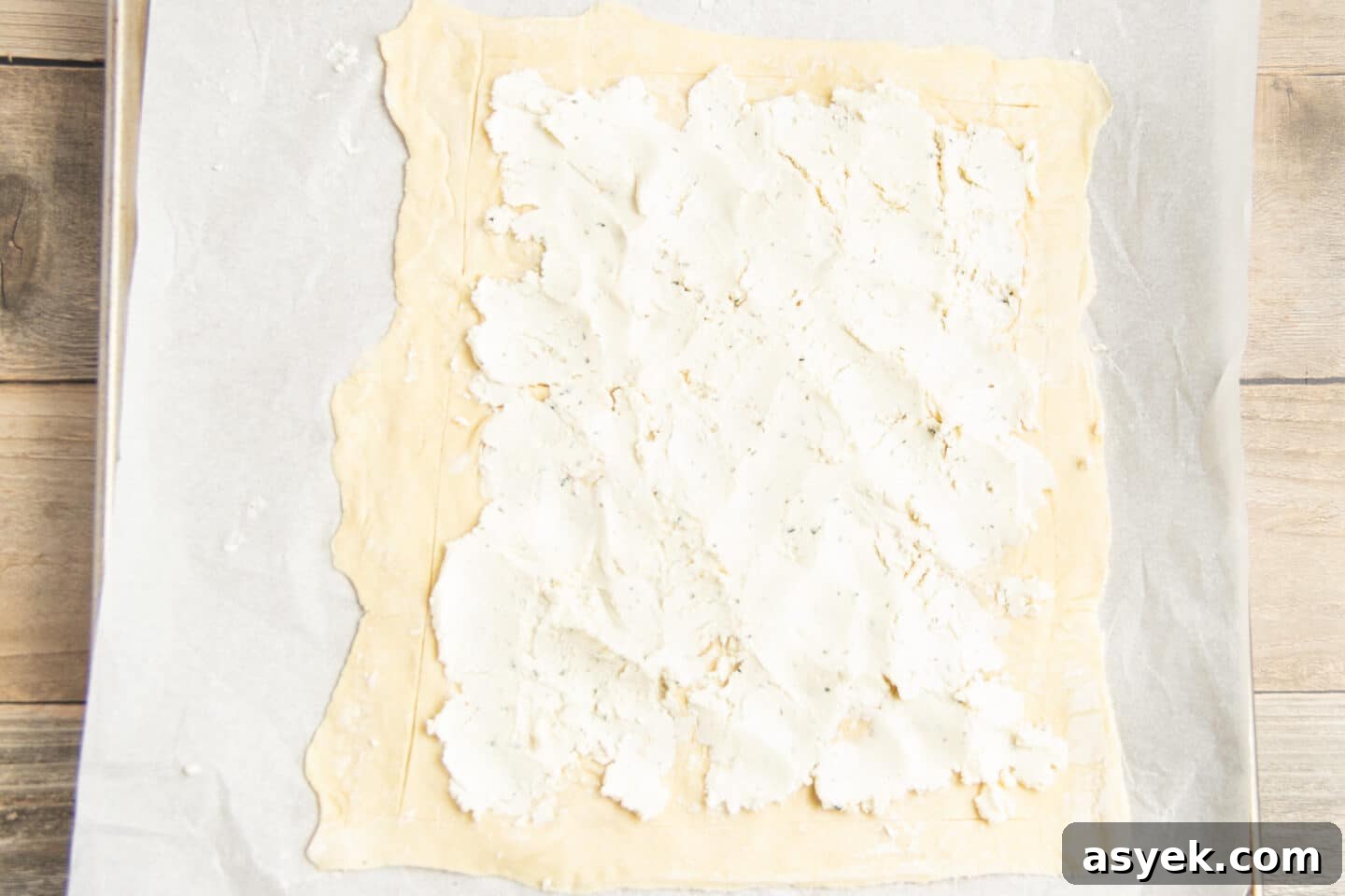 Asparagus and Boursin Puff Pastry Tart Recipe 6 This is a picture of the puff pastry with Boursin on it.