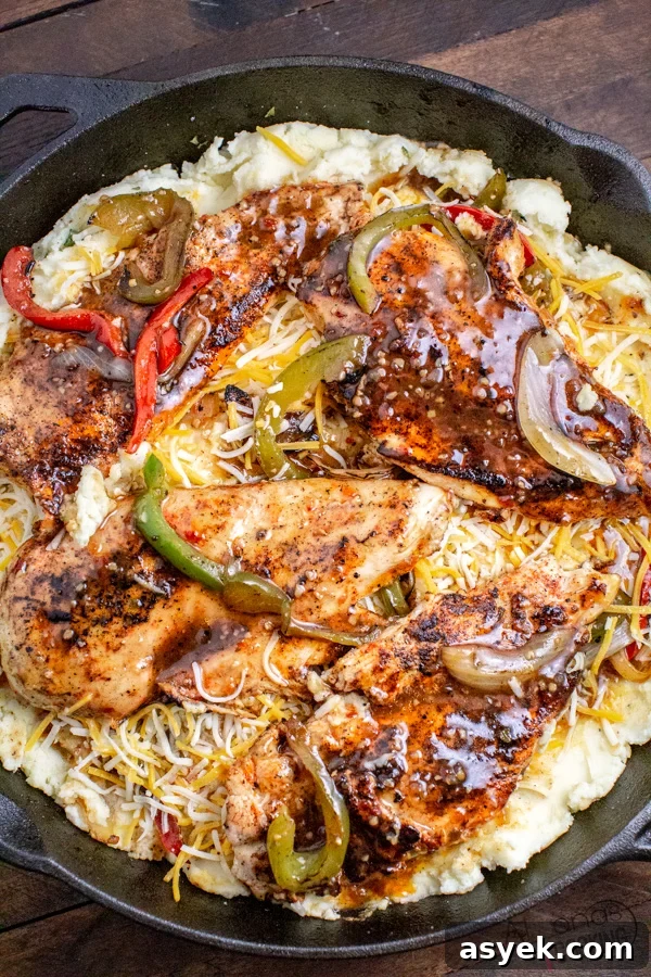 TGI Friday's Sizzling Chicken and Cheese Copycat Recipe 5 image of assembled sizzling chicken and cheese