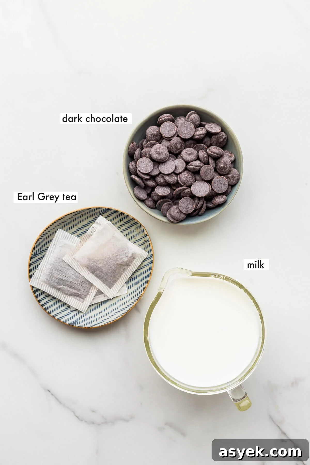 How to Make Earl Grey Hot Chocolate 3 Ingredients to make hot chocolate from scratch measured out.