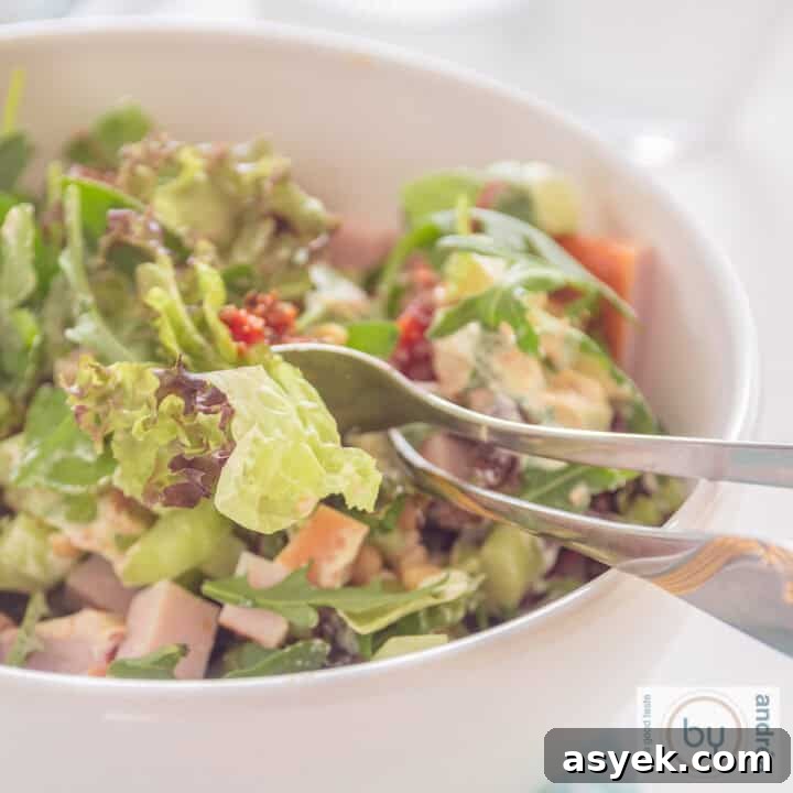 Green salad with smoked chicken and sun-dried tomatoes